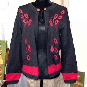 Vintage black and red alpaca sweater size L made in Bolivia by Artesanias A.T.